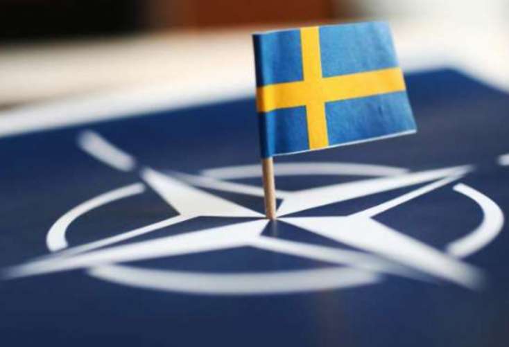 İsveçin NATO-ya daxil olması barədə müraciətin ratifikasiyası imzalandı