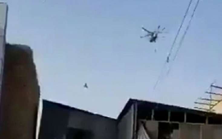 “Taliban” tərcüməçini helikopterdən asdı -