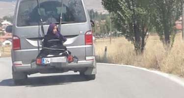 Qadını avtobusun arxasına bağlayıb yük kimi daşıdılar
