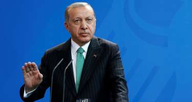 Ərdoğandan itən jurnalistlə 