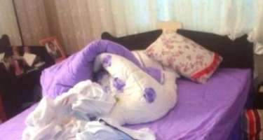 Arvadının xəyanət etdiyindən şübhələnən ər yatdığı yerdə başını kəsdi - 