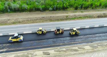 Bakı-Quba yoluna yeni asfalt-beton örtüyü döşənir - 