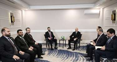 İlham Əliyev Suriyanın keçid dövrü Prezidenti ilə görüşdü -