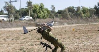 İŞİD pilotsuz aparatlarla qətliam törətdi - FOTOLAR