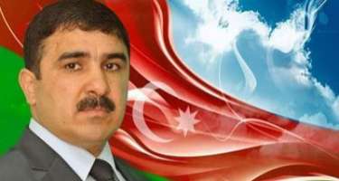 Azərbaycan bayrağını yüksəklərə qaldıran  Milli Qəhrəman