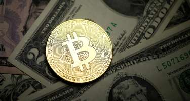 "Bitcoin" yenidən bahalaşır