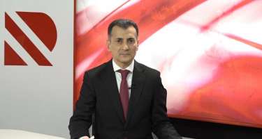 Vətən və qürbət arasında 